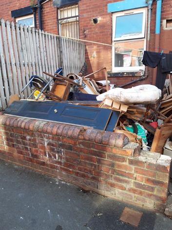 Severe accumulation of waste in garden