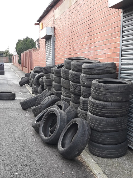 Tyres fly tipped on Back Cowper Grove