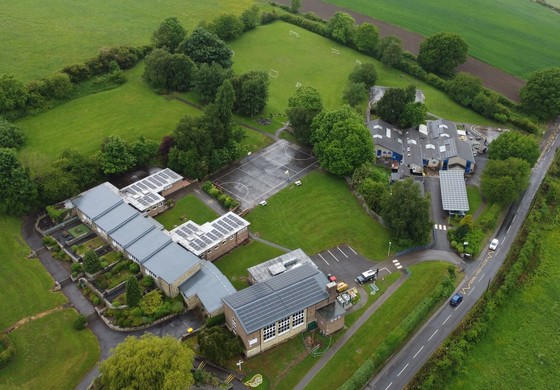 Aerial photograph of Bardsey Primary School showing green upgrades including solar panels on the roof.