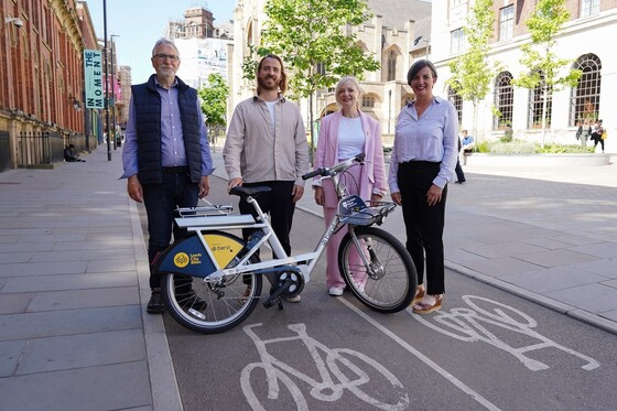 Representatives from Leeds Cycling Campaign, Beryl, the Mayor of West Yorkshire, and Leeds City Council with one of the new bikes.