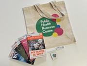 Picture of the prize draw, including a PHRC tote bag, pen, and selection of quick read books
