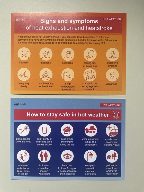 An orange card showing signs and symptoms of heatstroke and a blue card showing how to stay safe in hot weather