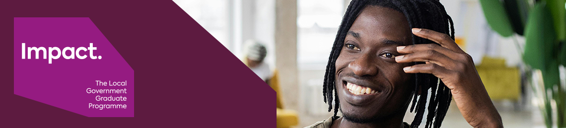 impact logo and smiling man behind it