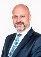 Head and shoulders shot of Andrew Hughes