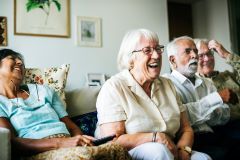 Happy older people in care setting