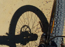 Bike wheel in shade