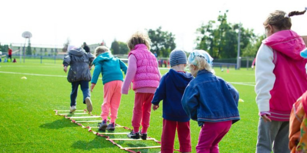 Young people playing on a field