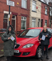 Nicola and Katie distributing leaflets in Moston