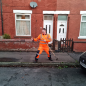 Street cleansing team doing a deep clean of Moston