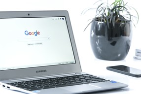 Photo of a laptop with the Chrome browser displayed