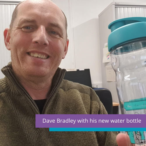 David Bradley pictured with Our Manchester water bottle