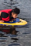 boy on a paddleboard