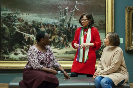 Three older women chatting