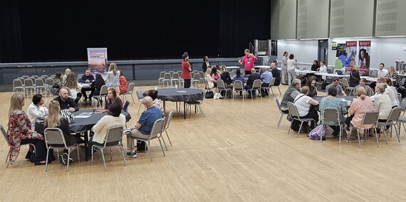 Image of people engaged in discussion workshops 