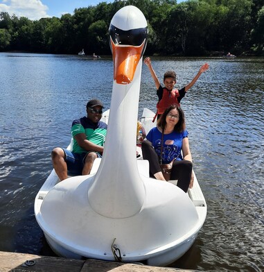Family in swan boat