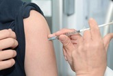 Flu vaccine being given in an arm