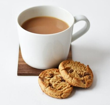 A cup of coffee and biscuit