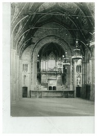 Image is an archive photograph that shows the Great Hall interior, with the organ at the end of the room.