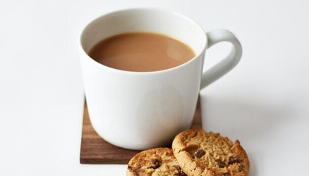 Cup of coffee and a biscuit