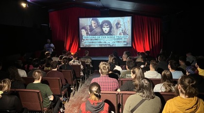 People watching a film at GRUB cinema