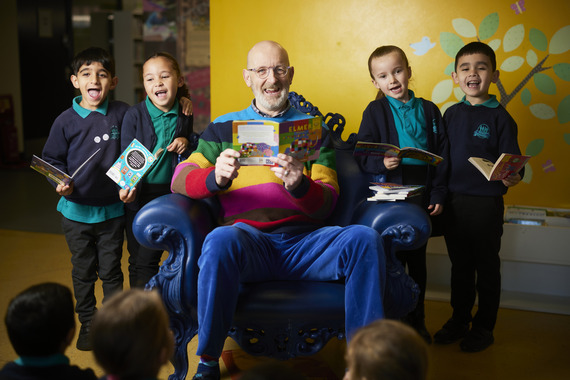Author and illustrator Nick Sharratt pictured with four Benchill Primary School children