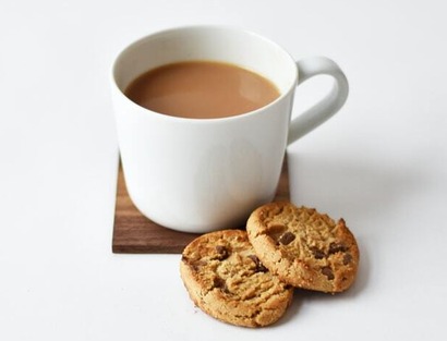 Coffee cup and biscuits