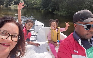 Family on a swan boat