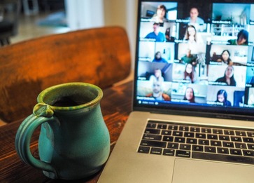 Zoom meeting with a cup of coffee