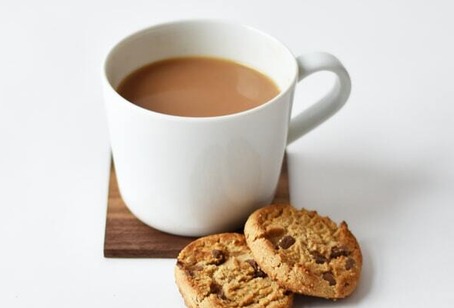 Coffee cup and biscuit