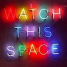 'Watch this space' in neon lights