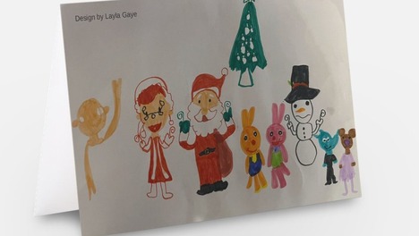 Card showing Santa and children, designed by chid