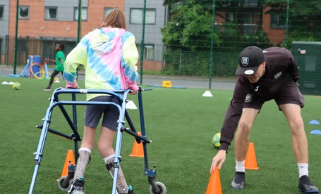 Disabled child playing sport
