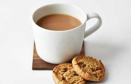 Coffee cup and biscuits
