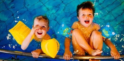 Children having fun in a swimming pool