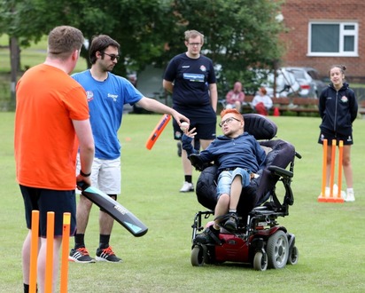 Young people playing disability cricket