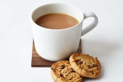 Coffee cup and biscuits