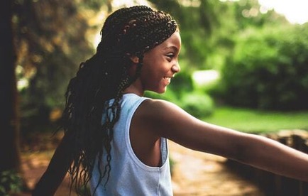 Girl enjoying park in the summer