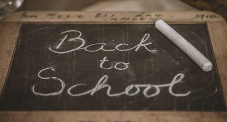 'Back to School' written on a slate with chalk