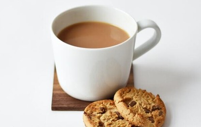 Coffee cup and biscuits