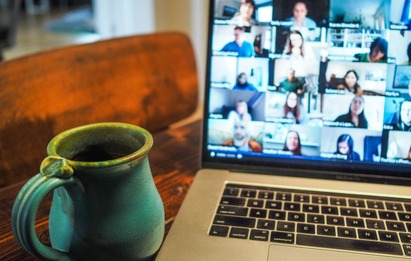 Online meeting with a coffee cup