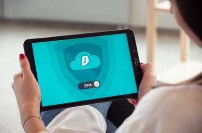 Woman holding a tablet