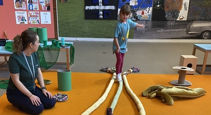 Child playing in the art gallery