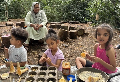 Family playing in the woods