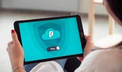 Woman holding a tablet