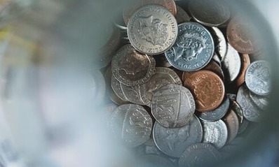 Money at the bottom of a jar