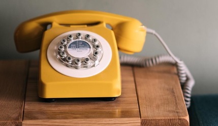 Telephone by a settee