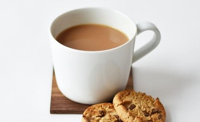 Coffee cup and biscuits