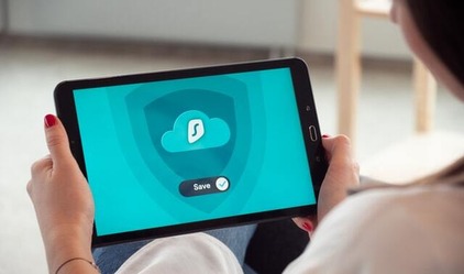 Woman holding a tablet