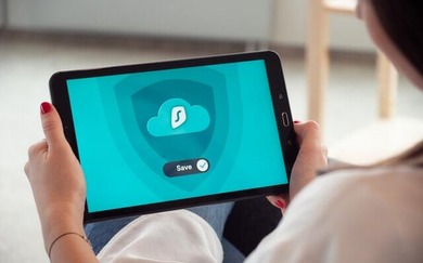 Woman holding a tablet