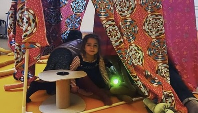 Girl in a den